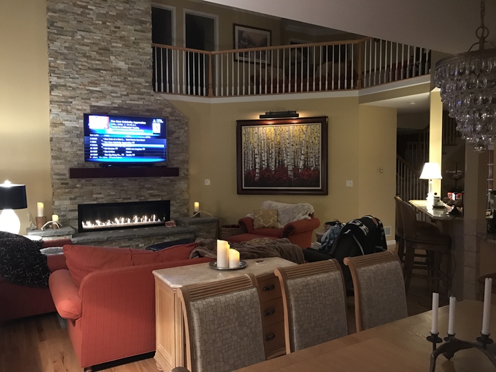 Content — Jill and Howie's commissioned birch lake painting in their home — palette knife painting by Jennifer Vranes