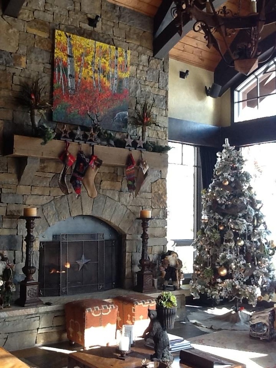 Above the fireplace in Phyllis Leiser's home — palette knife painting by Jennifer Vranes