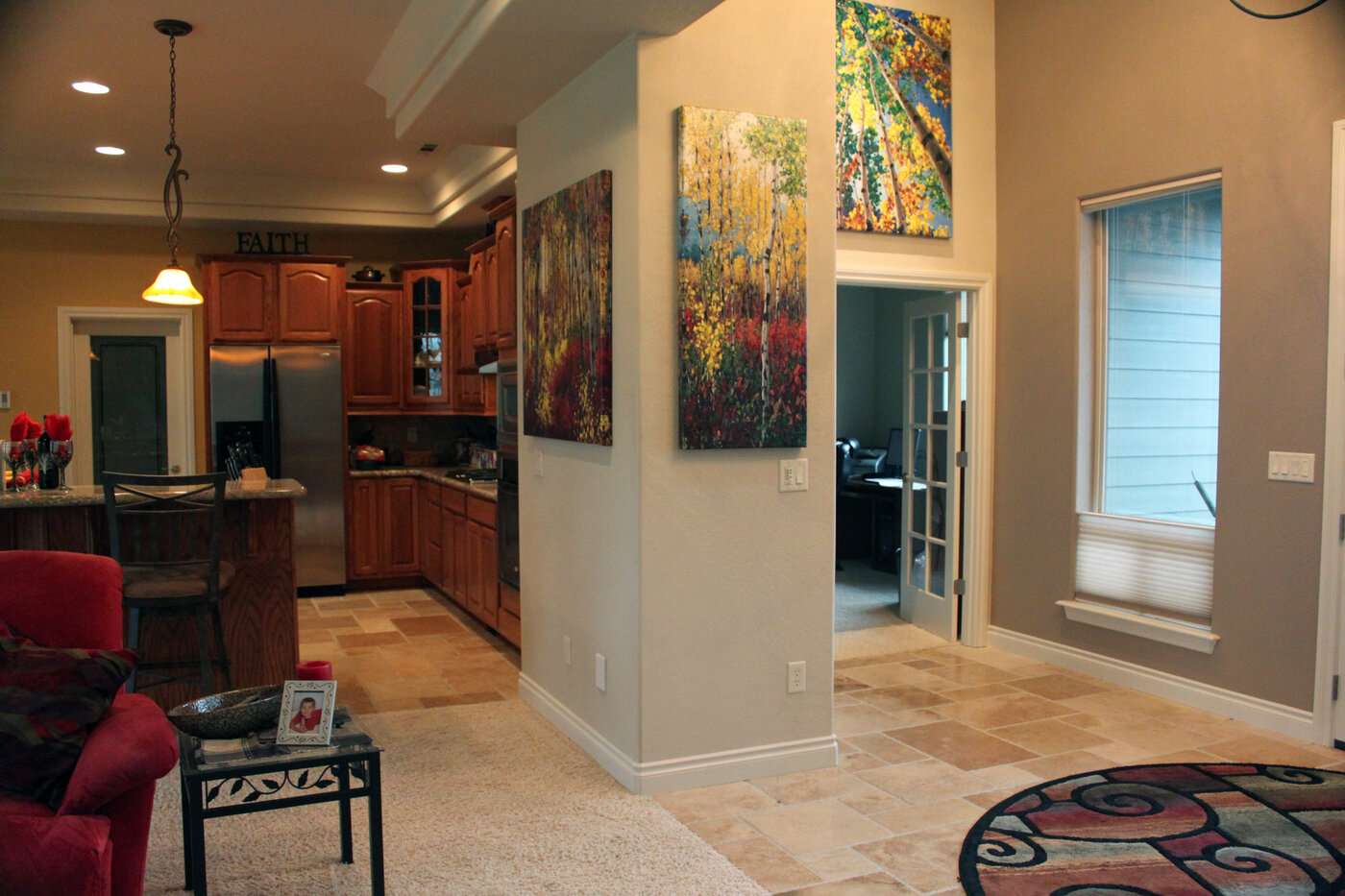 Three paintings in Brad's home