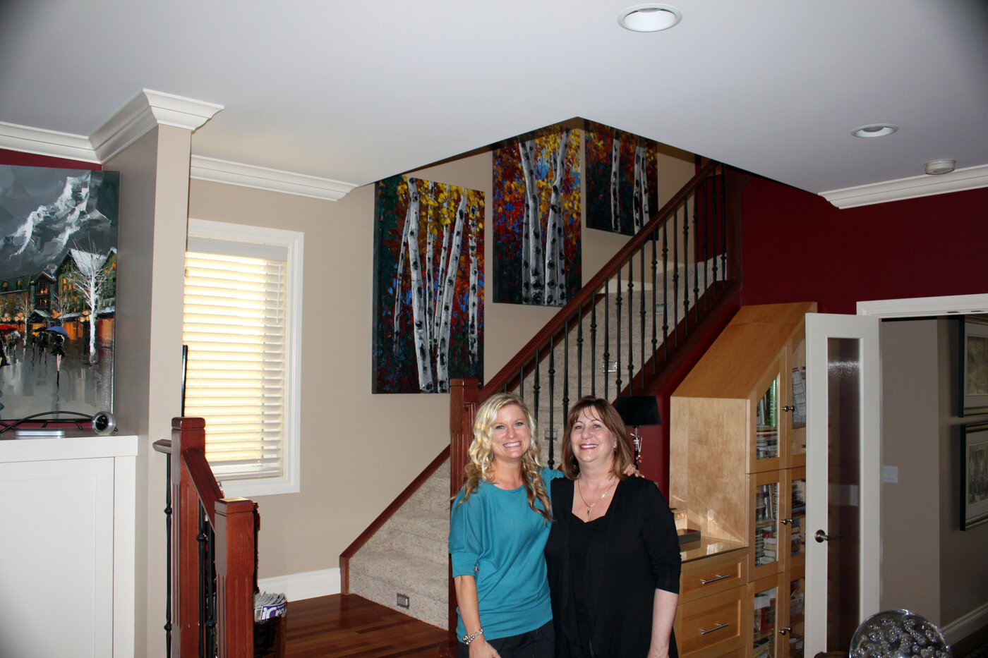 Jennifer with an Alberta collector — a triptych in the stairwell