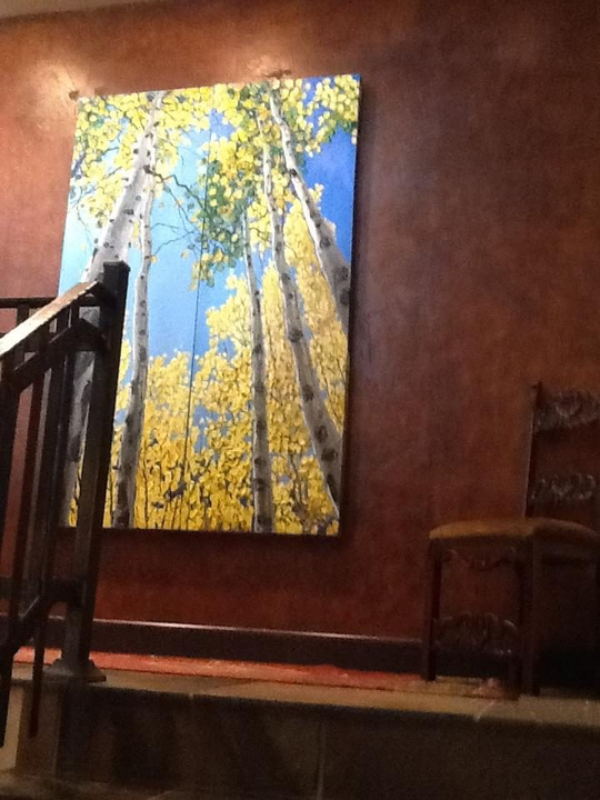 On the stair landing in Phyllis Leiser's home — palette knife painting by Jennifer Vranes