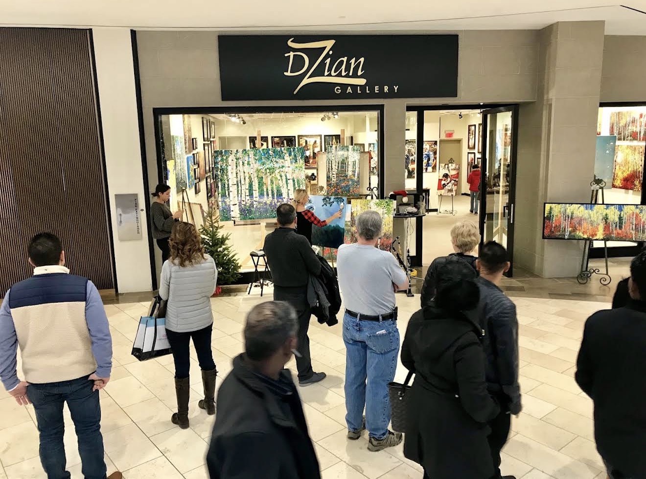 Dzian Gallery storefront with aspen paintings in the window