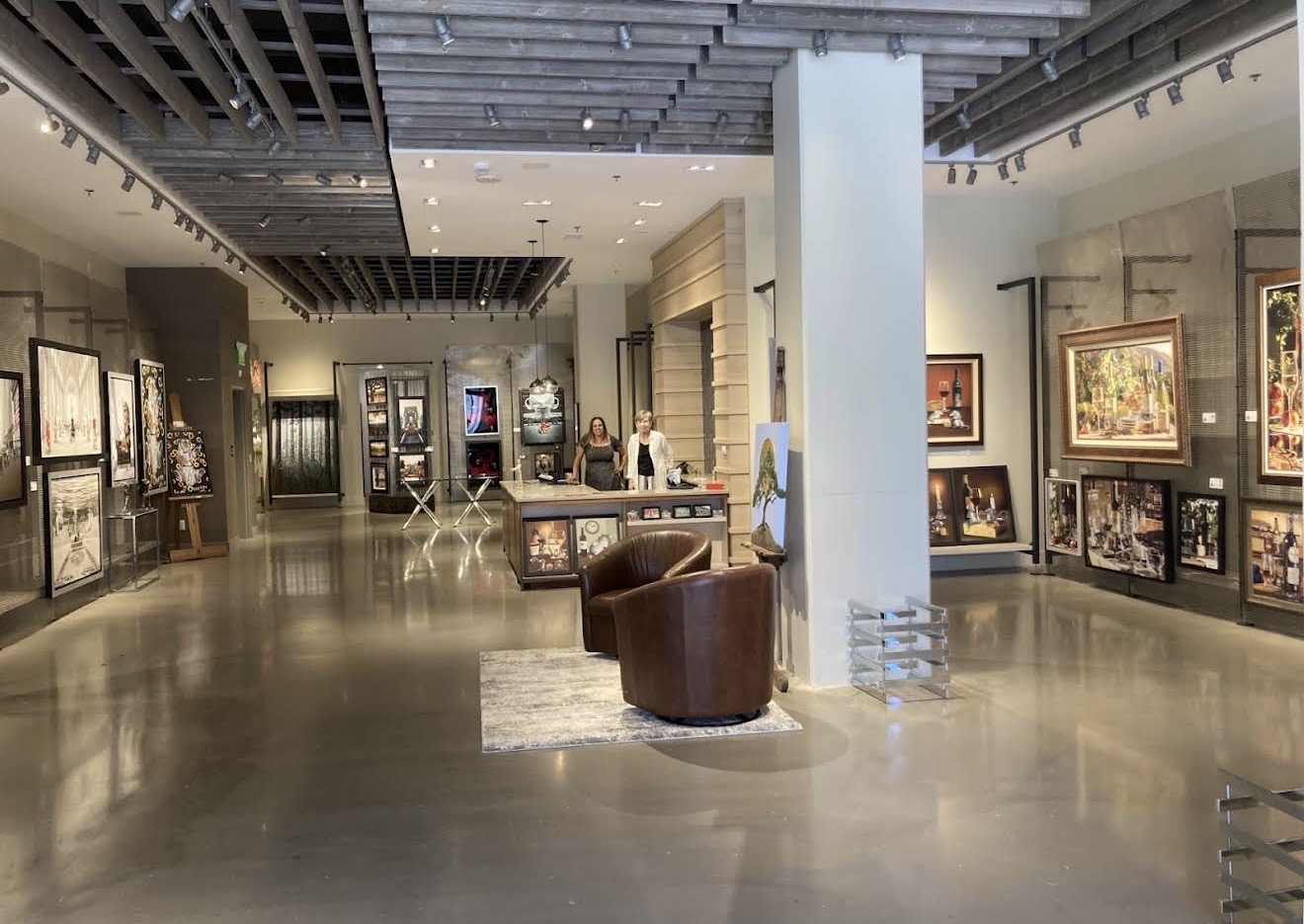 Interior of Gallery 1870 in Napa, with two women at the front desk